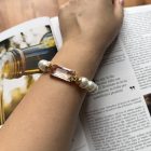 BRACCIALE di perle con cristallo centrale - immagine 2