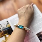 BRACCIALE di perle con cristallo centrale