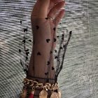 BRACCIALE a maglia con vari charm